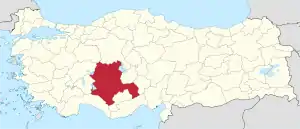 Konya highlighted in red on a beige political map of Turkeym