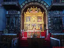 Altar of the St. Mary's Church in Kottayam flanked by two Saint Thomas crosses from the 7th century AD on either side. The crosses pre-date the church which was built in 1550 AD.