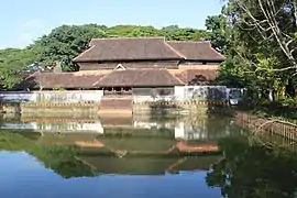 The backside of the Krishnapuram palace, with the pond in its foreground.