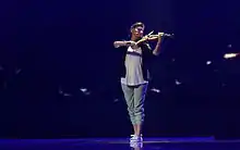 Ksenija Milosevic plays on violin during Eurovision Song Contest 2012