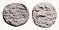 Copper coin of the Tarim Basin, area of Hotan, 1st-2nd century CE.Obv:: Chinese characters: LUH (六) TCHU TSIEN "Six tchu (of) money"Rev:: Depiction of a horse. Prakrit legend in Kharoshthi script: GUGRAMAYA.