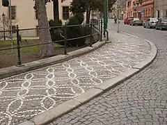 Old sidewalk with granite curb in Kutná Hora, Czech Republic