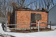 Brick outbuilding on manor site