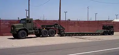 Lowboy trailer attached to an Oshkosh MTVR of the U.S. Marines