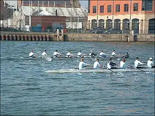 Queen's University Belfast Boat Club based in Stranmillis, racing University College Dublin on the River Lagan.