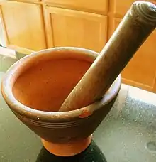 A Lao‑style mortar and pestle.