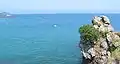 Le Saut Geffroy, or Geoffroy's Leap, can be seen here at right, and in the background stretches St. Catherine's breakwater