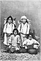 1892: posed photo of working children. The older ones have loaded pack frames. Boys and girls are together.