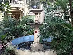 fountain fronting the building facade