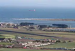 Aerial view looking east over Leuchars.