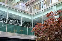 View of offices on the second floor, as seen from the building's courtyard