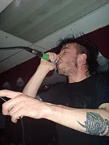 AxeWound singer Liam Cormier with Cancer Bats in Barcelona on 22 June 2008