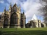 East end of Lincoln Cathedral, with wall buttress, and chapter house with flying buttresses. (1185–1311)