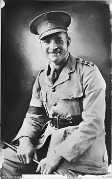 A black and white photograph of a male in uniform