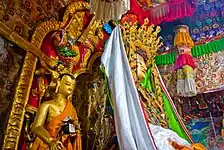 Statues of buddhas at a Litang monastery of the Tibetan Buddhist tradition.