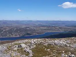 A long lake surrounded by hills