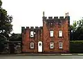 Lodge of the demolished Childwall Hall, 48 Childwall Abbey Road(c.1835; Grade II)