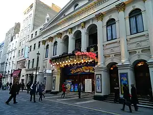 Image 29Music hall evolved into variety shows. First performed in 1912, the Royal Variety Performance was first held at the London Palladium (pictured) in 1941. Performed in front of members of the Royal Family, it is held annually in December and broadcast on television. (from Culture of the United Kingdom)