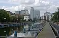 Looking towards Pan Peninsula and Canary Wharf from the south end of Millwall Dock.