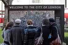 Image 30Tourists consulting a map near St Paul's Cathedral (from Tourism in London)