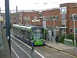 Stadler Variobahn tram 2556 calls at Reeves Corner Tramstop