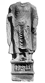 Buddha from Loriyan Tangai with inscription mentionning the  "year 318", thought to be 143 CE.