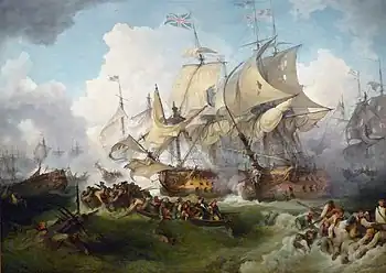 Two large ships sail side by side locked in battle as heavy brown seas roll beneath them and clouds of smoke from other vessels in the background drift into frame. In the foreground, dozens of men cling to wreckage in the water or drift in small boats.