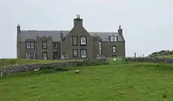 Colour photograph of a stone building