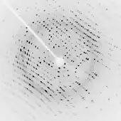 Image 37Image of X-ray diffraction pattern from a protein crystal. (from Condensed matter physics)