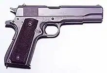 Color photograph of a firearm (a Colt 45).