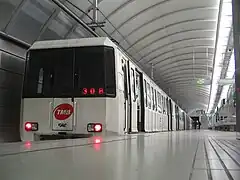 A Series 3000 train in the platform