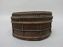 Chinese-style charcoal basket (sairō-sumitori) for Japanese tea ceremony. Timber bamboo, dwarf bamboo, and rattan. Edo period, 19th century