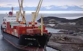 American Tern unloading containers at McMurdo Station