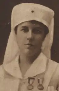 Madeleine, Marquise d'Andigné, from a 1916 newspaper, dressed in a nurse's uniform, with two medals pinned to chest.