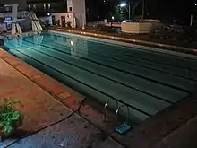 Outdoor swimming pool at night