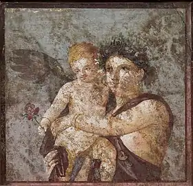 A figure wearing a laurel wreath holds a winged child.