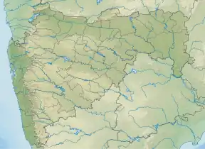 Sina Dam is located in Maharashtra