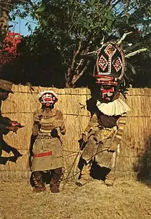 Image 60Makishi dancer, found in North-Western Zambia, represent spirits of a deceased who returns to assist the living (from History of Zambia)