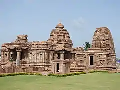 Photo of brown cone-topped temple ruins