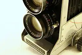 Bottom lens of 105 mm unit with aperture and shutter speed controls