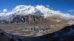 Manang village. Annapurna-III (left, 7555 m) and Gangapurna (7455 m) peaks are in the background.