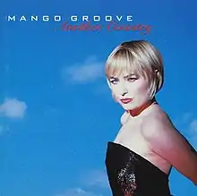 Album cover: Claire Johnson stands in profile, and turns her head slightly toward the camera. Johnston wears a black gown by Elzbieta Rosenwerth, and her blond hair is cut short. She is lit from the front. Above her head the band's name appears in a white type; and the album title is in a red script. The matte background is of a blue sky with a few faint clouds.