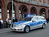 Mercedes-Benz Police patrol vehicle of the State Police of Baden-Württemberg with blue-silver livery, seen in Mannheim.