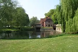 The watermill seen from the lawns of the house