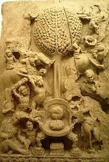 An aniconic representation of Mara's assault on the Buddha, with an empty throne, 2nd century, Amaravati, India.