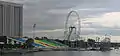 The Float at Marina Bay in 2007, with the Singapore Flyer under construction in the background.