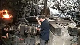 A blacksmith at Montgaillard Forge