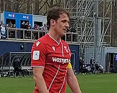 Trafford walking on the pitch during a match