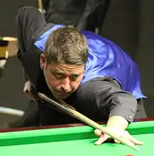 Matthew Stevens playing a shot