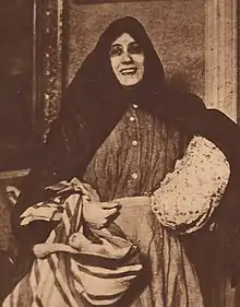 Mazie E. Clemens demonstrating her "peasant girl" costume, from a 1919 publication.